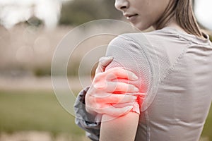 Hands, arm pain and injury in nature after accident, workout or training outdoors. Sports, health and athlete or woman