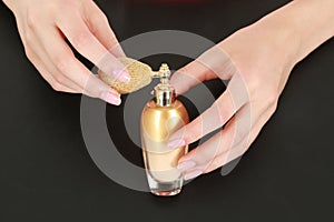 Hands with atomizer
