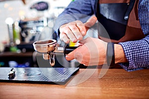 Hands bartender baristas make coffee cocoa cappuccino