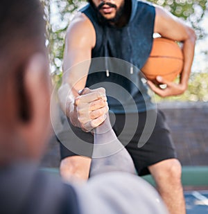 Hands, basketball and help with a man athlete and rival playing a competitive game on a sports court. Team, exercise and