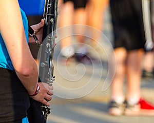 The hands of a bass clarinet player