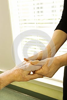 Hands being massaged.