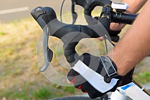 Hands on bicycle's handlebars
