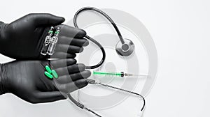 Hands in black medical gloves holding pills and ampoules on white background. Cardiovascular desease treatment concept.