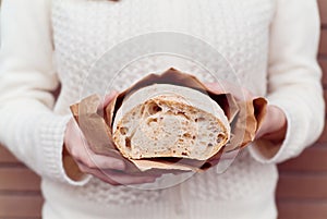 Hands with bread