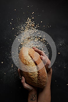 Hands with a bread