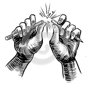 Hands breaking pencil