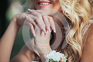 Hands bride with manicure