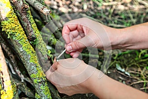 Hands burning matches