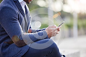 Hands, business man and phone in town for contact, travel and internet for networking in outdoors. Male person, commute