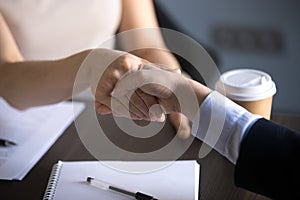 Hands of business women shaking making partnership deal, respect