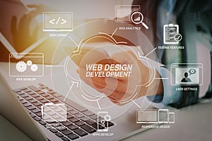 Hands of businessman using mobile phone in modern office with la