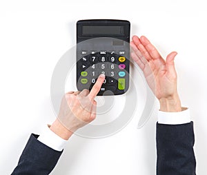 Hands businesswoman and black calculator