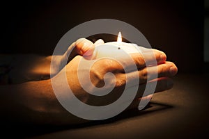 Hands with candle