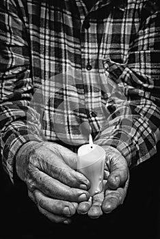 Hands and candle