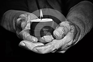 Hands and candle