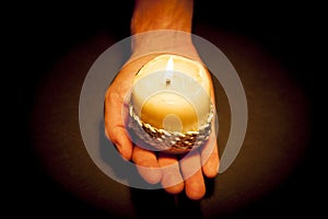 Hands with candle