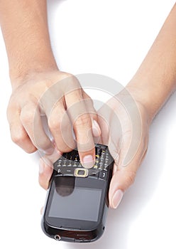 Hands on cellphone typing SMS