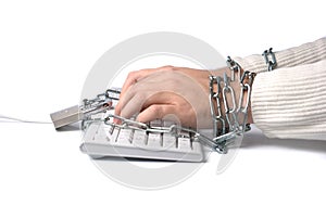 Hands chained to keyboard