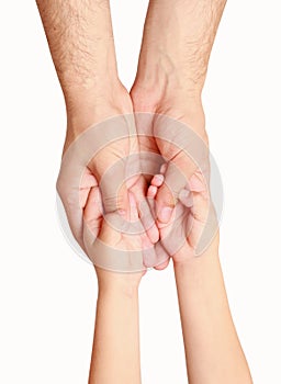 Hands of the child in the hands of an adult male