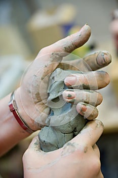 Hands and clay