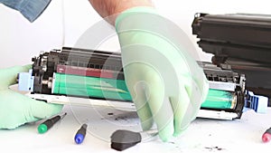 Hands cleaning toner cartridge