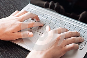 Hands closeup typing a message