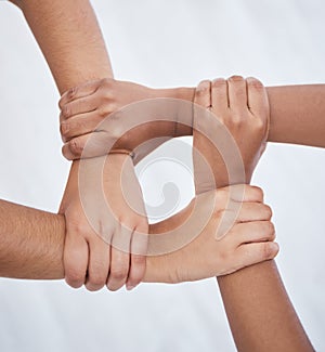Hands, collaboration and joined people holding hands for unity, solidarity and connection. Community, support and
