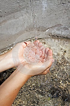 Hands that collect water