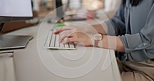 Hands, computer and keyboard with a business woman at her desk in the office, searching for information online. Email