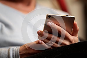 Hands continually touching the telephone keypad