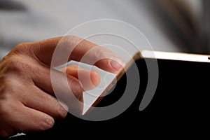 Hands continually touching the telephone keypad