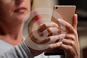 Hands continually touching the telephone keypad