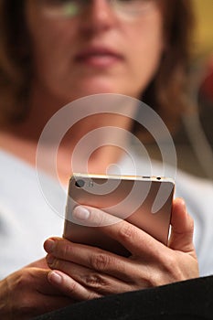 Hands continually touching the telephone keypad