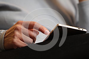 Hands continually touching the telephone keypad