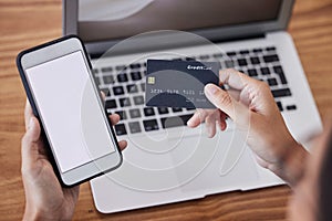 Hands, credit card and phone mockup for ecommerce, purchase or electronic transaction at office desk. Hand of shopper