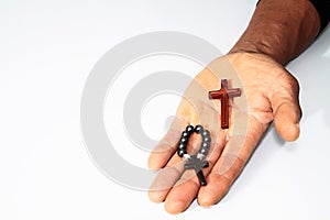 Hands with cross symbolizing love of god