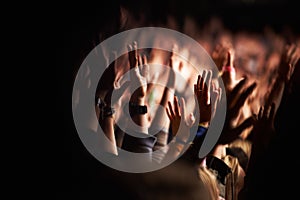 Hands, crowd or audience or music festival at night for a party or event of celebration together. Concert, disco or