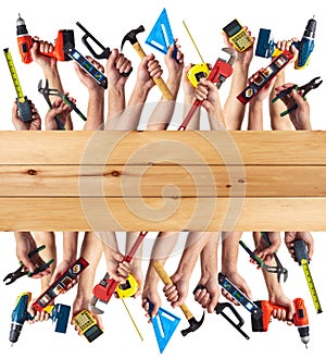 Hands with DIY tools.