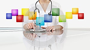 Hands of doctor woman touch digital tablet at office desk with empty icons, copy space isolated in white background