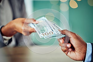 Hands, dollars and businessmen exchanging cash at a bank, making a purchase or deal. Closeup of money, investment and