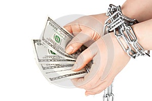 Hands with dollars in chain