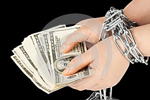 Hands with dollars in chain