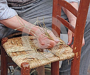 hands of an elderly craftsman