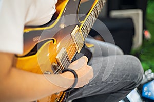 Hands and Electric guitars of young guitarists playing guitar concepts