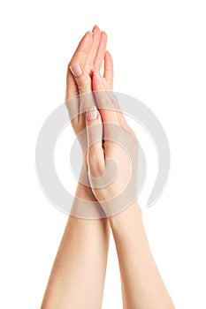 Hands. Empty two hands raised up, beg. Close up of beautiful female hands isolated on white background