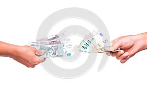 Hands exchange rubles for euros. People exchange currency, hands transmit money. photo