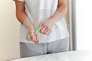 Hands with exercises putty manufacturer photo