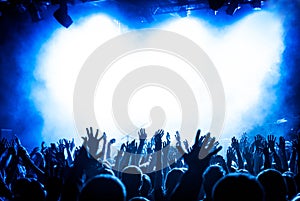 Hands fans during a concert