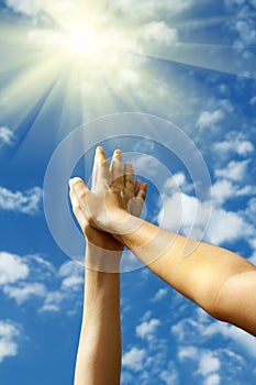 Hands female sky sun